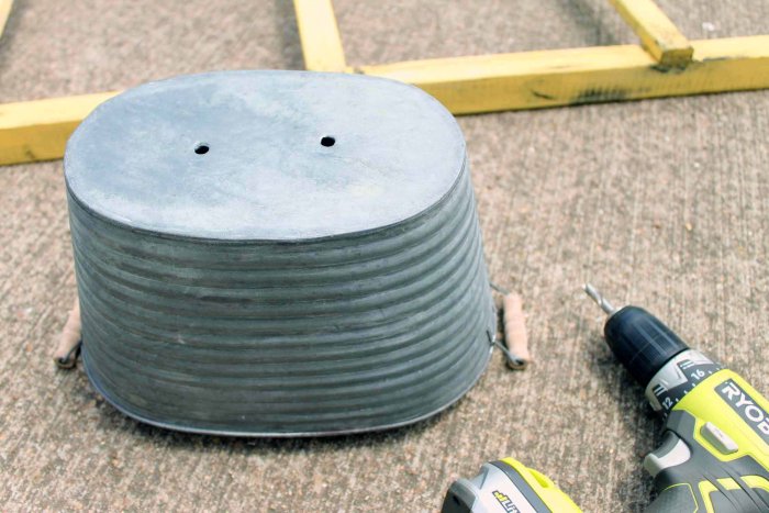 Add containers large enough to support a vegetable garden and drill holes for drainage. (Photo courtesy of Angie Holden/The Country Chic Cottage)